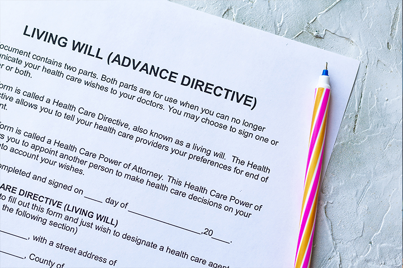 Filling Living Will Advance Directive form.